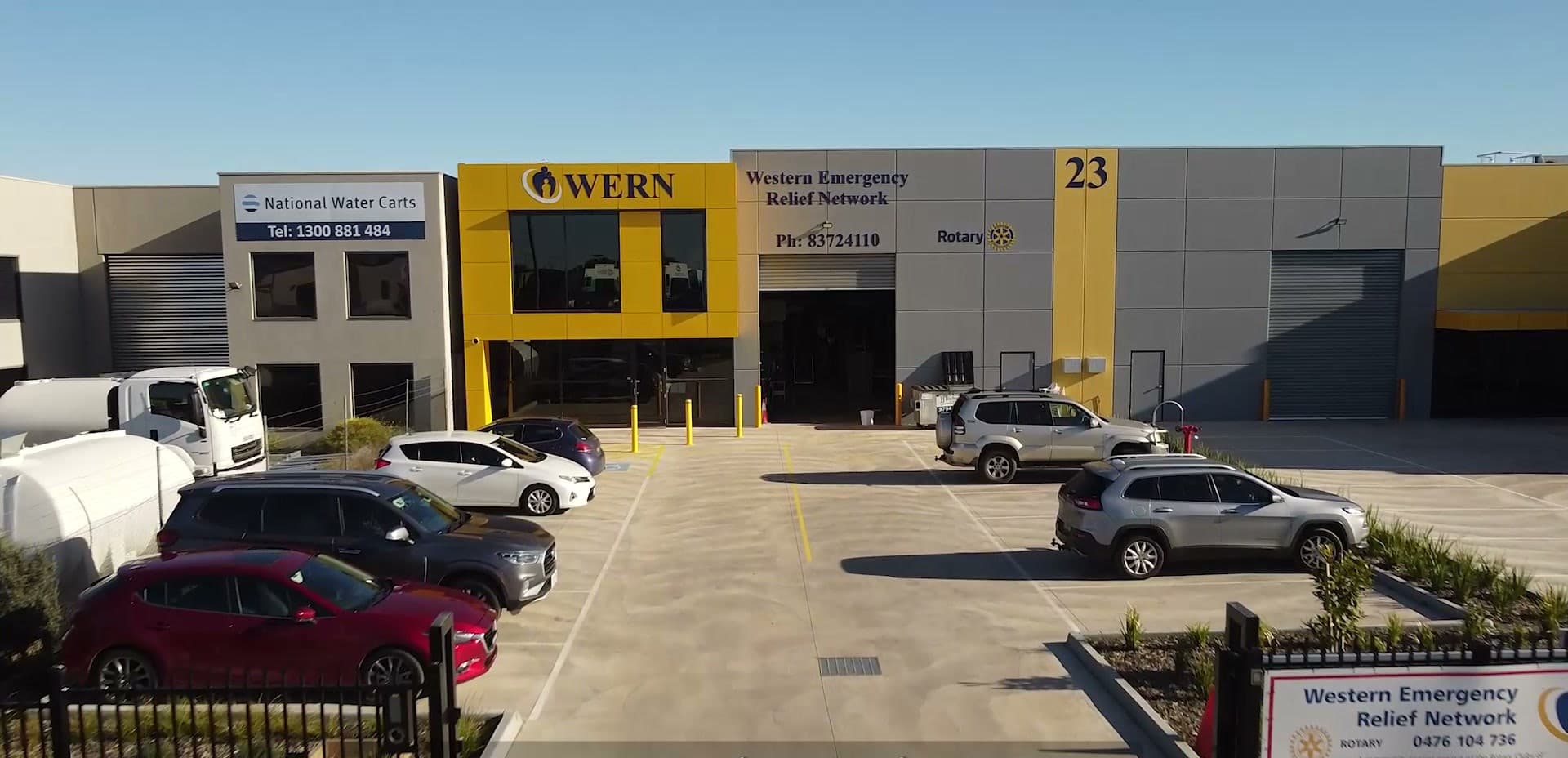 The WERN warehouse at 23 Westwood Drive, Ravenhall, with the WERN and Rotary signage above the roller door.